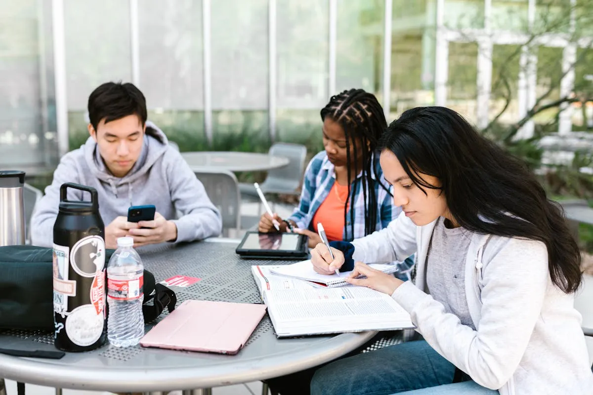 Diverse international students engaged in focused IGCSE tutoring — Cambridge & Edexcel exam preparation
