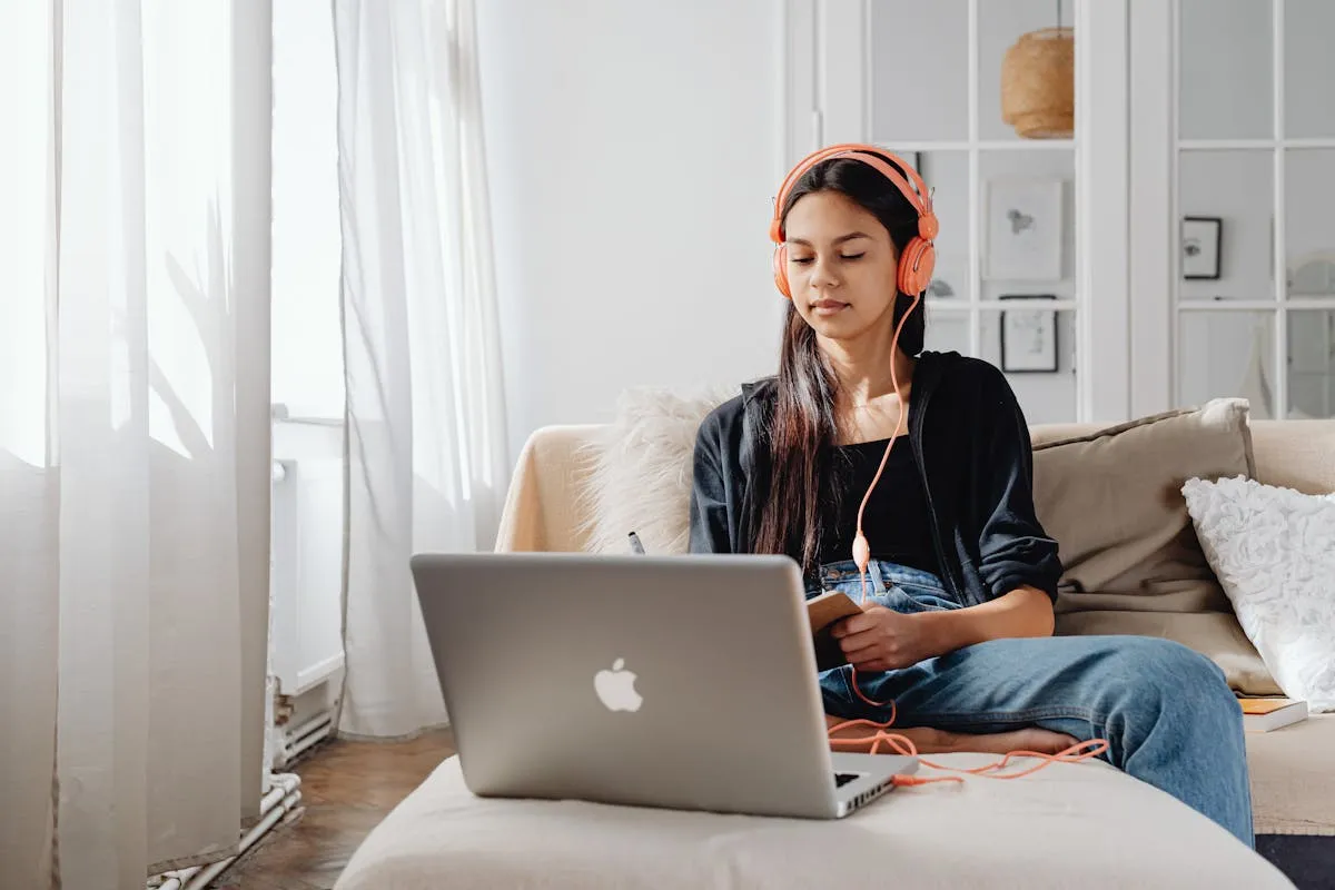 Student using laptop for online IGCSE tutoring